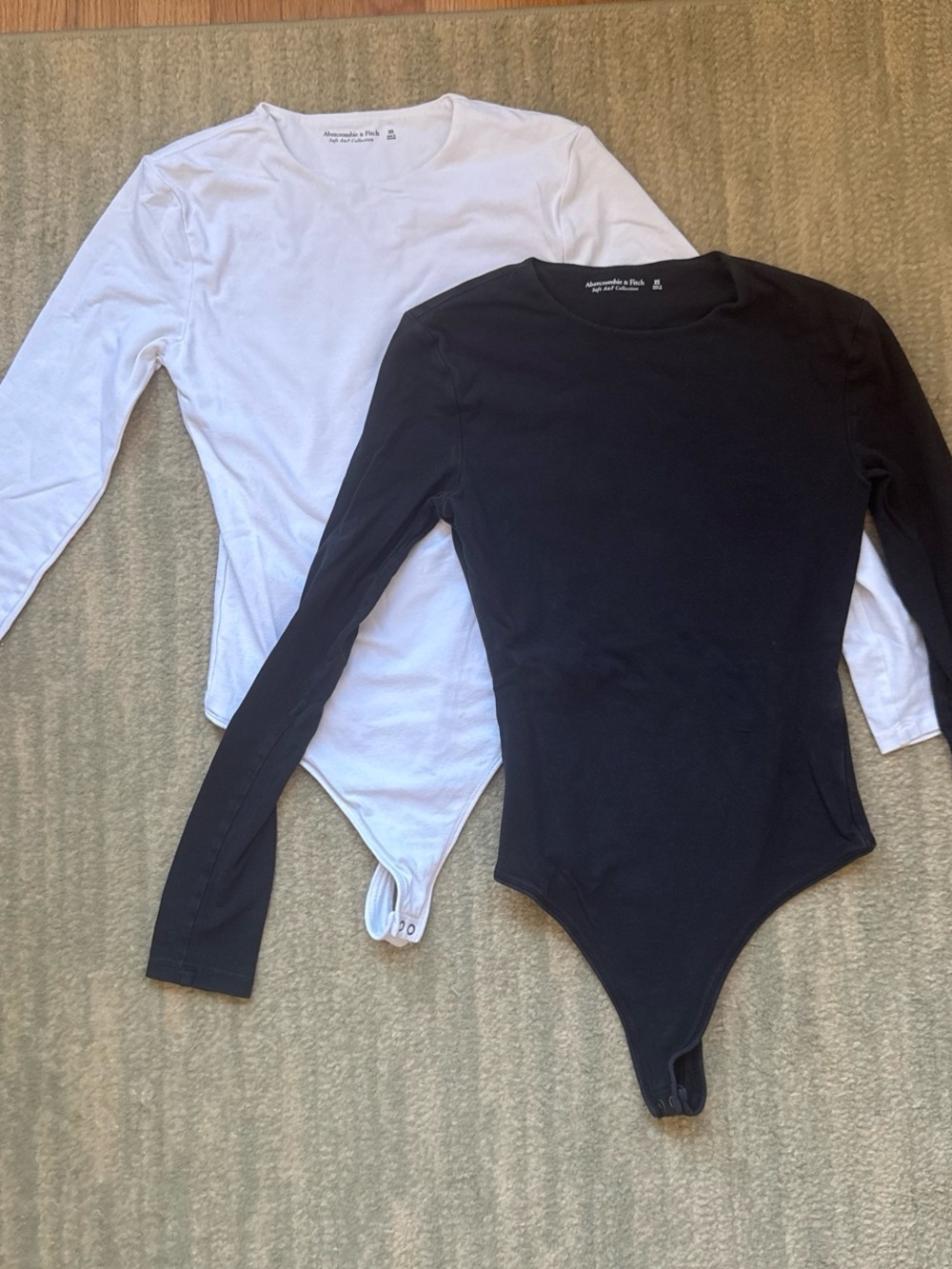 Abercrombie & Fitch black & white long sleeve bodysuits